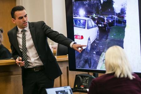 Attorney Evan Bariault uses a monitor to show the area where CPR was performed during an inquest into the shooting death of Che Taylor which involved Seattle police officers Michael Spaulding and Scott Miller on Thursday, February 2, 2017, at the King County Courthouse in Seattle. Credit: Johnny Andrews/Seattle Times (court pool photo)
