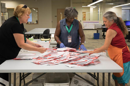 Ballot envelopes sorted by employees at King County Elections office in Renton, WA on July 31, 2017. (Matt M. McKnight / Crosscut)