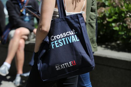 Person holding a Crosscut Festival tote