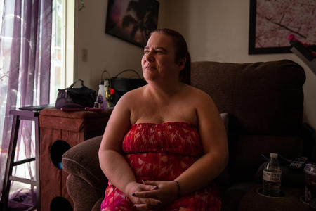 a women sits in her apartment in kent