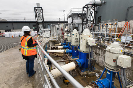 Marie Fiore, the public information officer for King County’s Wastewater Treatment Division, views the pumps during a tour of the Georgetown Wet Weather Treatment Station in Seattle