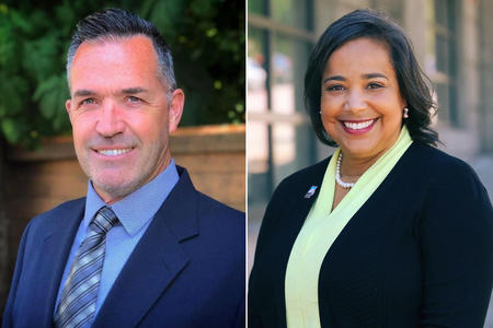 Steve Haverly in a blue suit jacket with blue shirt and tie; Victoria Woodards in a black blazer and greenish yellow shirt