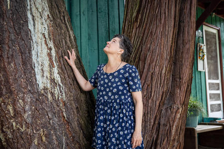 woman looking at tree