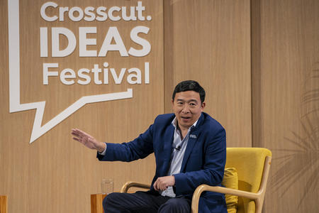 Andrew Yang speaks on stage during the Crosscut Ideas Festival in Seattle, Washington on May 6, 2023.
