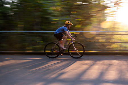 Danny Roberts rides across the Ravenna Park Bridge