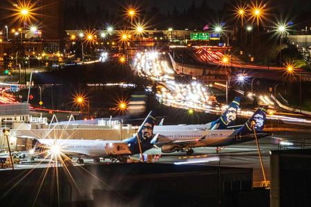 Airplanes at the SeaTac Airport at night