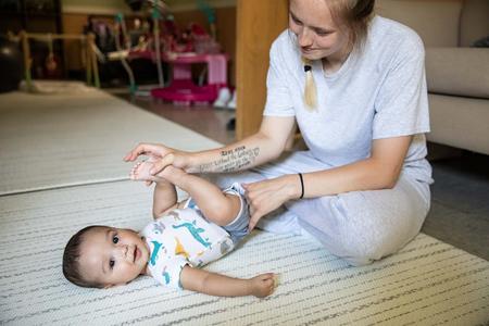 Paige Zorn plays with her boy Zaylin in the playroom of J-Unit at the Washington Corrections Center for Women